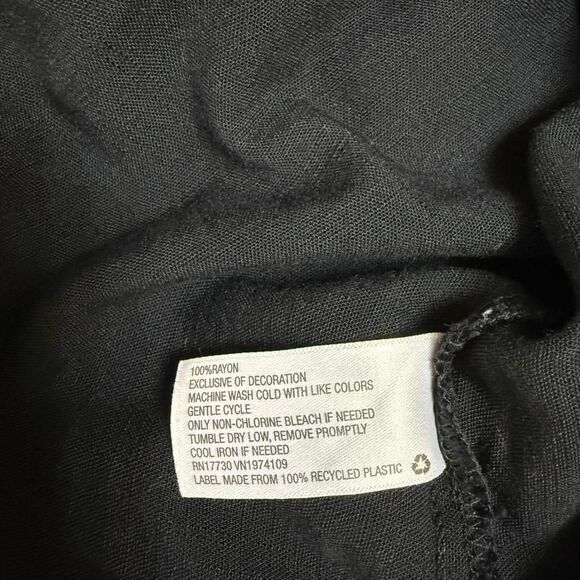 Black ruffle dress with flutter cap sleeves and ruffle hem size small - Picture 8 of 8